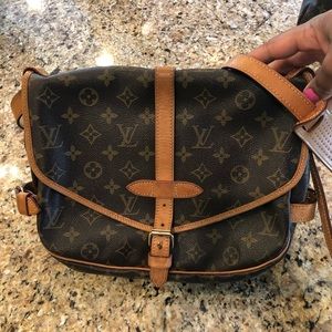SOLD ON Merc! Louis Vuitton Saumur
